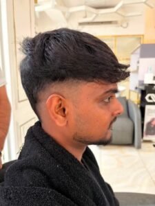 Beautiful model with long-lasting defined curls showcasing female hair perming treatment at Amedore Luxury Salon, Saheed Nagar Bhubaneswar